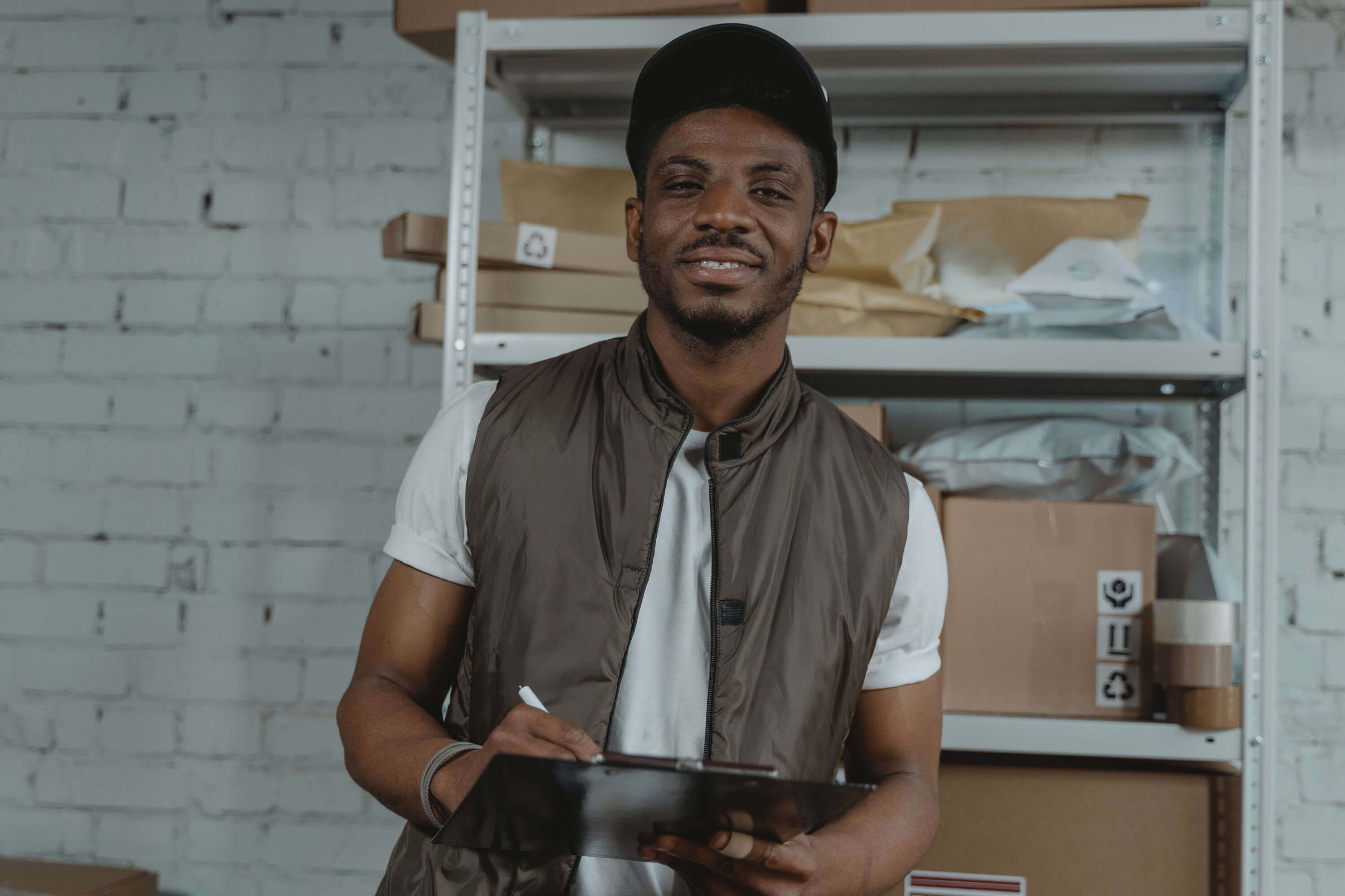 Small business owner standing in front of storage 